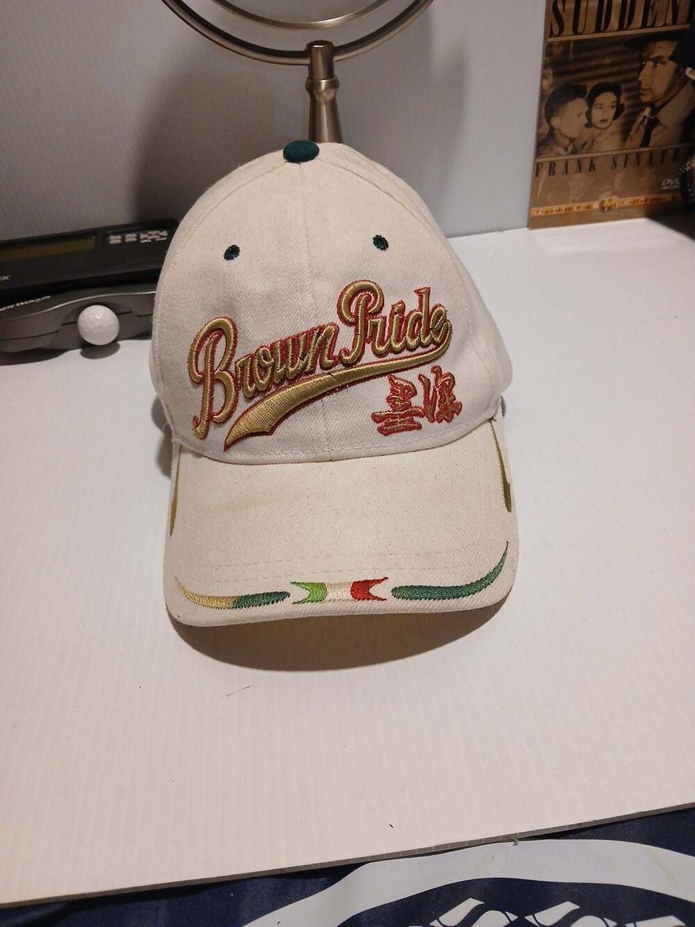 Dinos Brown Pride Embroidered White Dad Hat